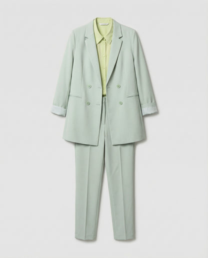 Light green suit with a shirt on a white background
