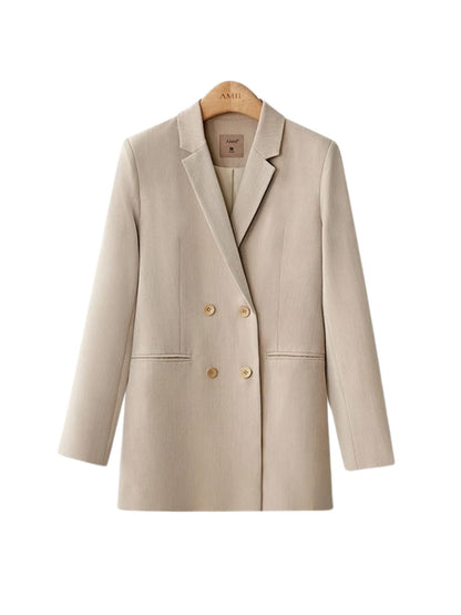 Beige oversized blazer displayed on a hanger