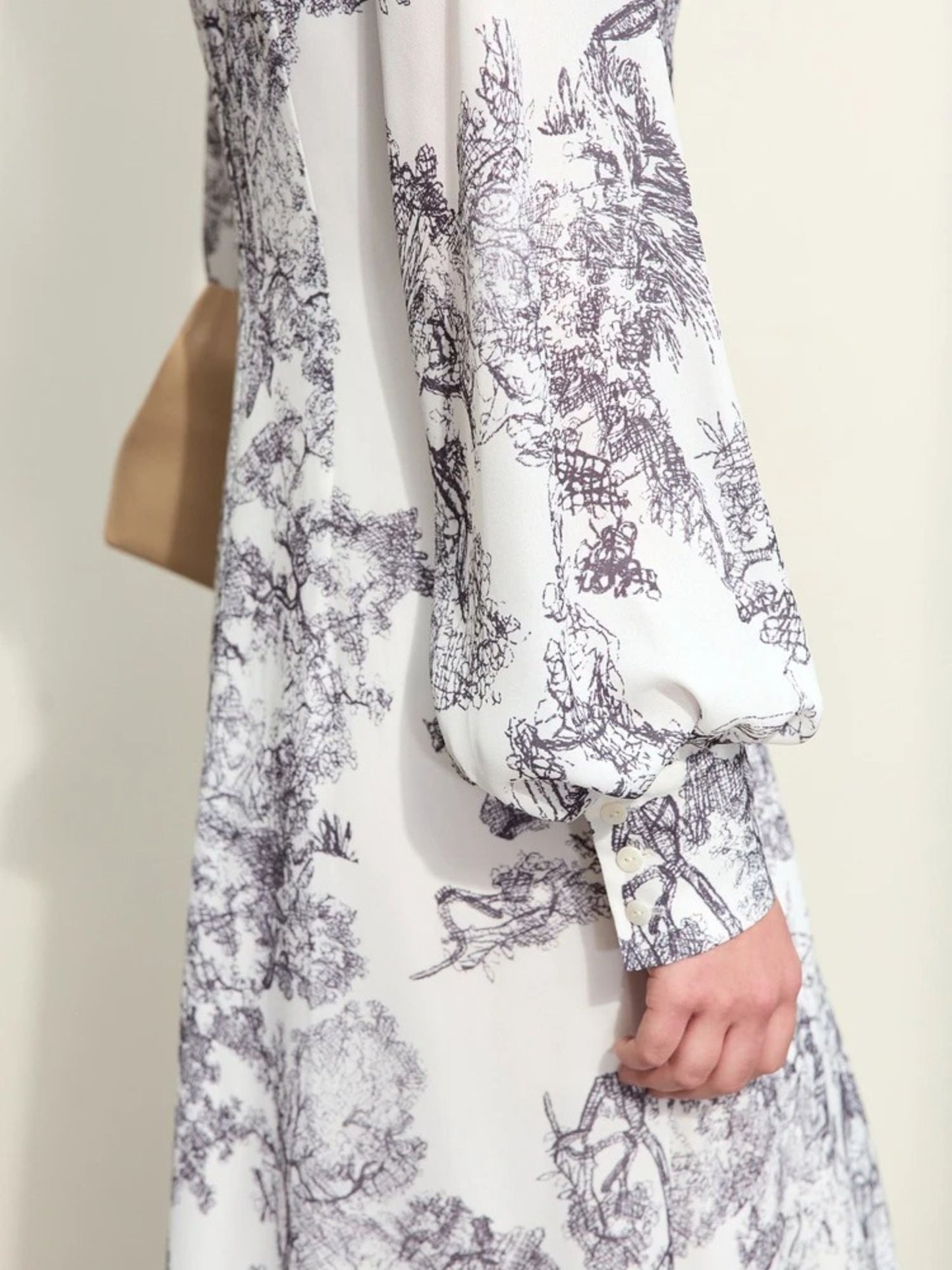Another Close-up of white floral wrap dress sleeve with ruched puff detail and cuff