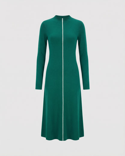 Green dress with a zipper on a white background