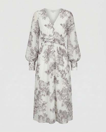 Floral patterned dress on a white background